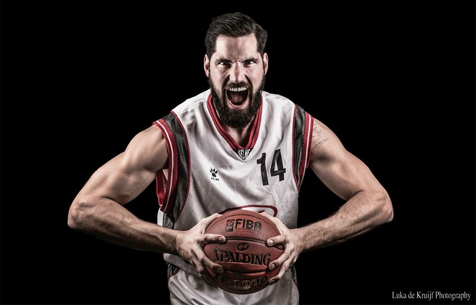 Lucas in white #14 jersey mid-roar — pro basketball portrait